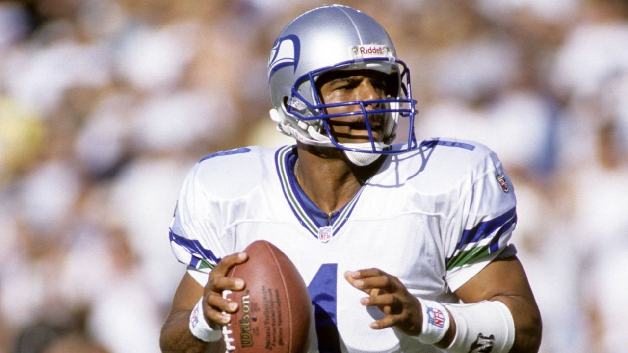 QB Warrer Moon con los Seattle Seahawks en 1997