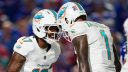 WR Jaylen Waddle y QB Tua Tagovailoa, Miami Dolphins. Foto: Cooper Neill/Getty Images