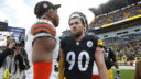 DE Myles Garrett (izquierda) y LB T.J. Watt (derecha)