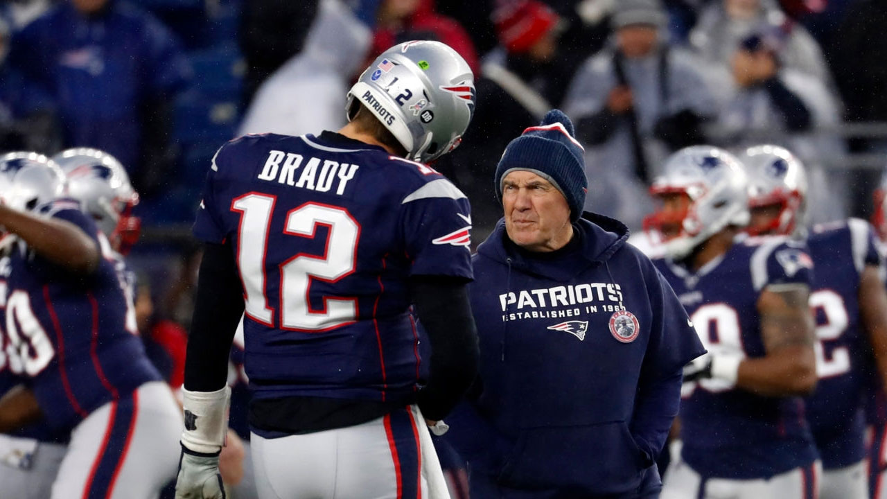 QB Tom Brady (12) y HC Bill Belichick en los New England Patriots.