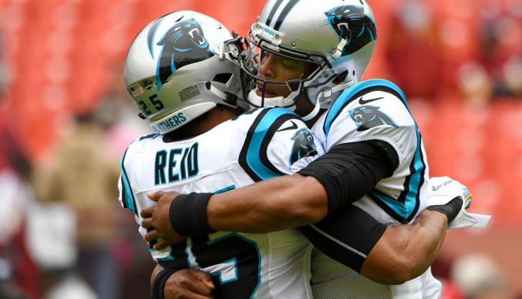 Eric Reid y Cam Newton / Foto de Getty Images