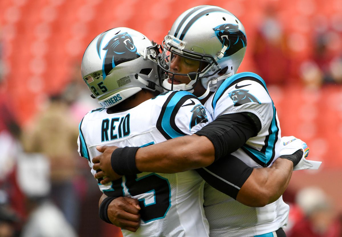 Eric Reid y Cam Newton / Foto de Getty Images